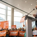 ndp leader advocates public ownership expansion
